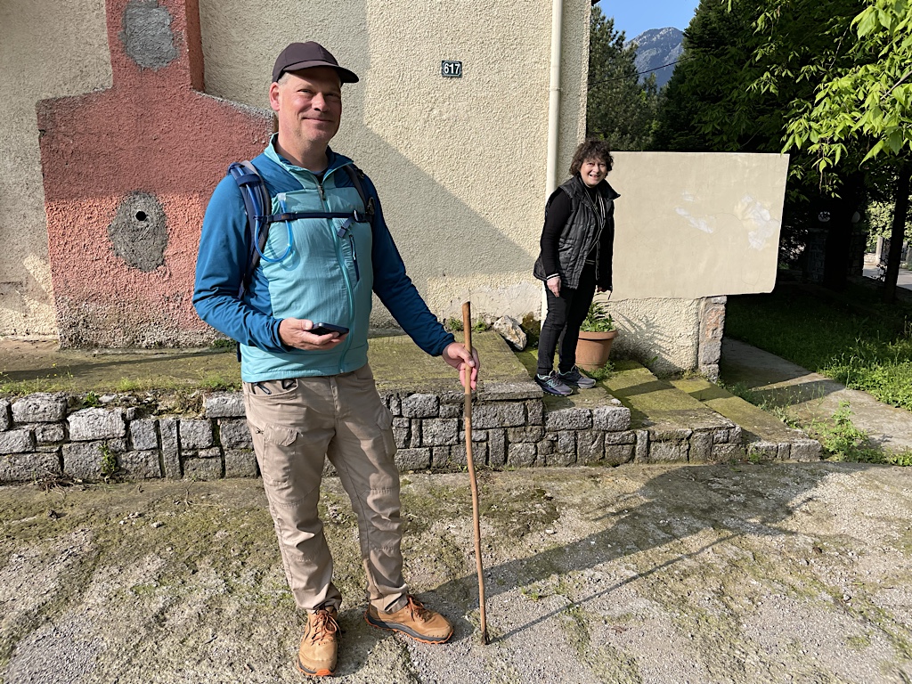 Mrs. Fifi insisted that Chris carry this stick to ward off dogs.