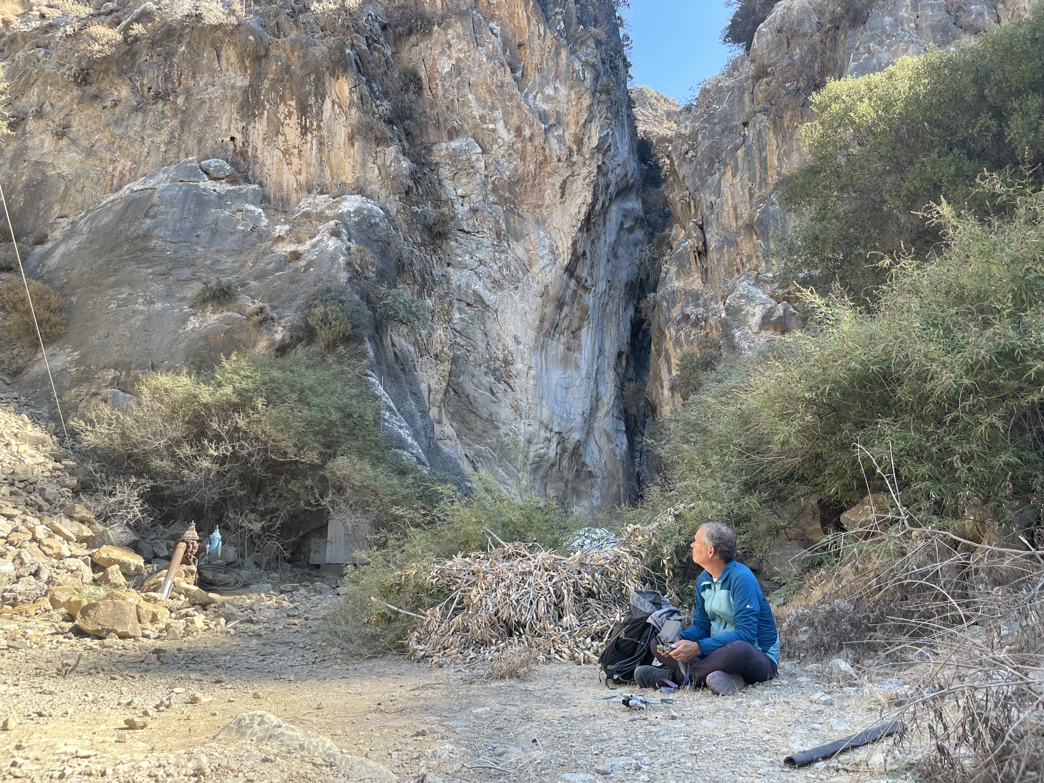 Chris sitting at the mouth of the gorge.