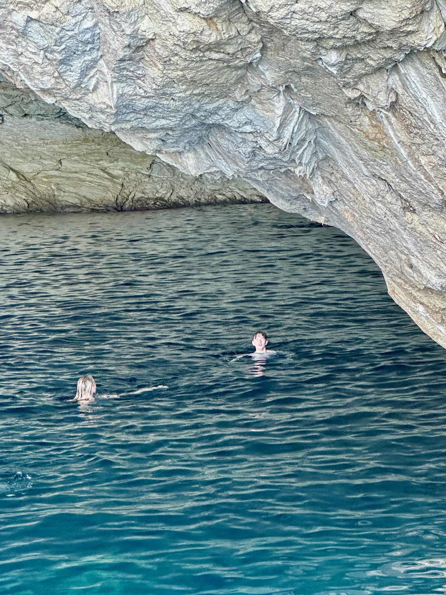 The young people and northerners jumped off the boat to swim in the cave. It was too early, too shady, and too cool for me.